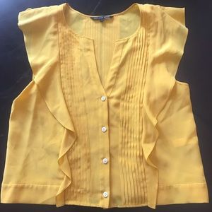 Yellow blouse with ruffles